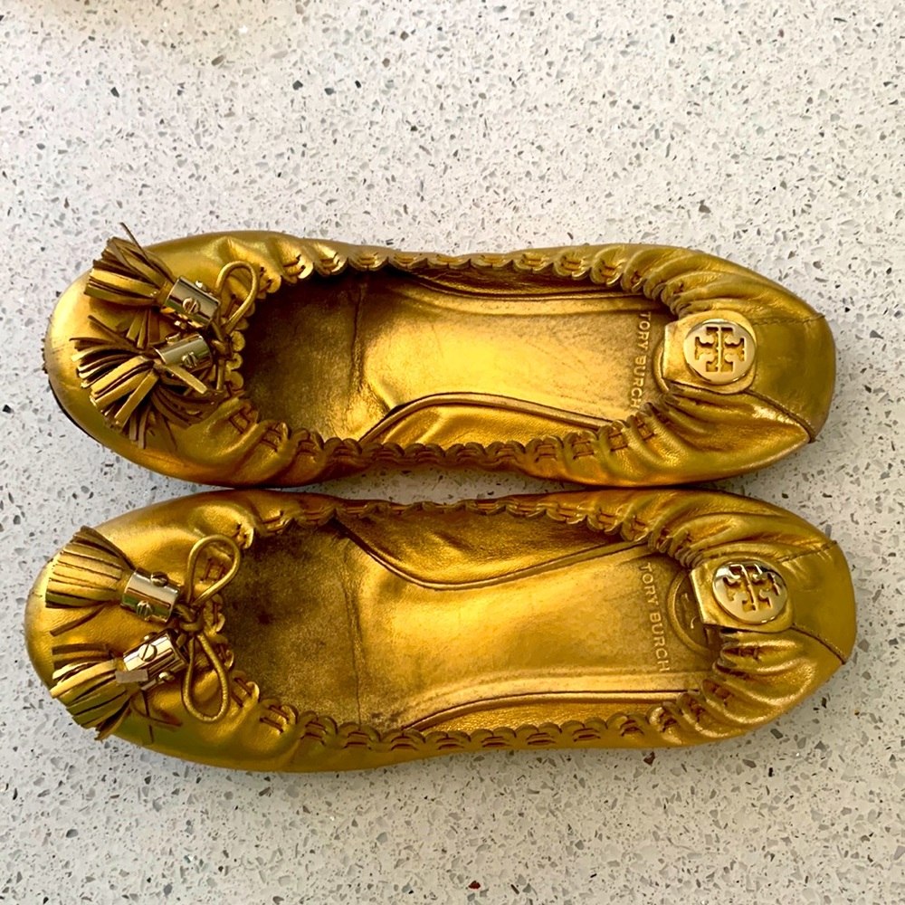 Golden ballets tory shoes.